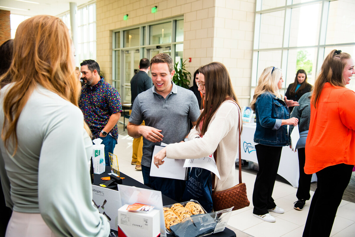 Professionals and the community mingle at job fair