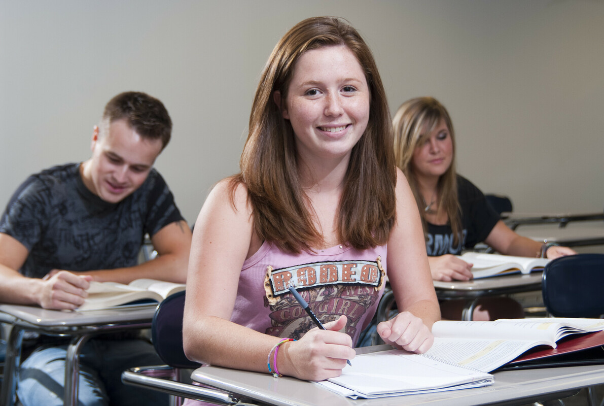 Students studying in classroom