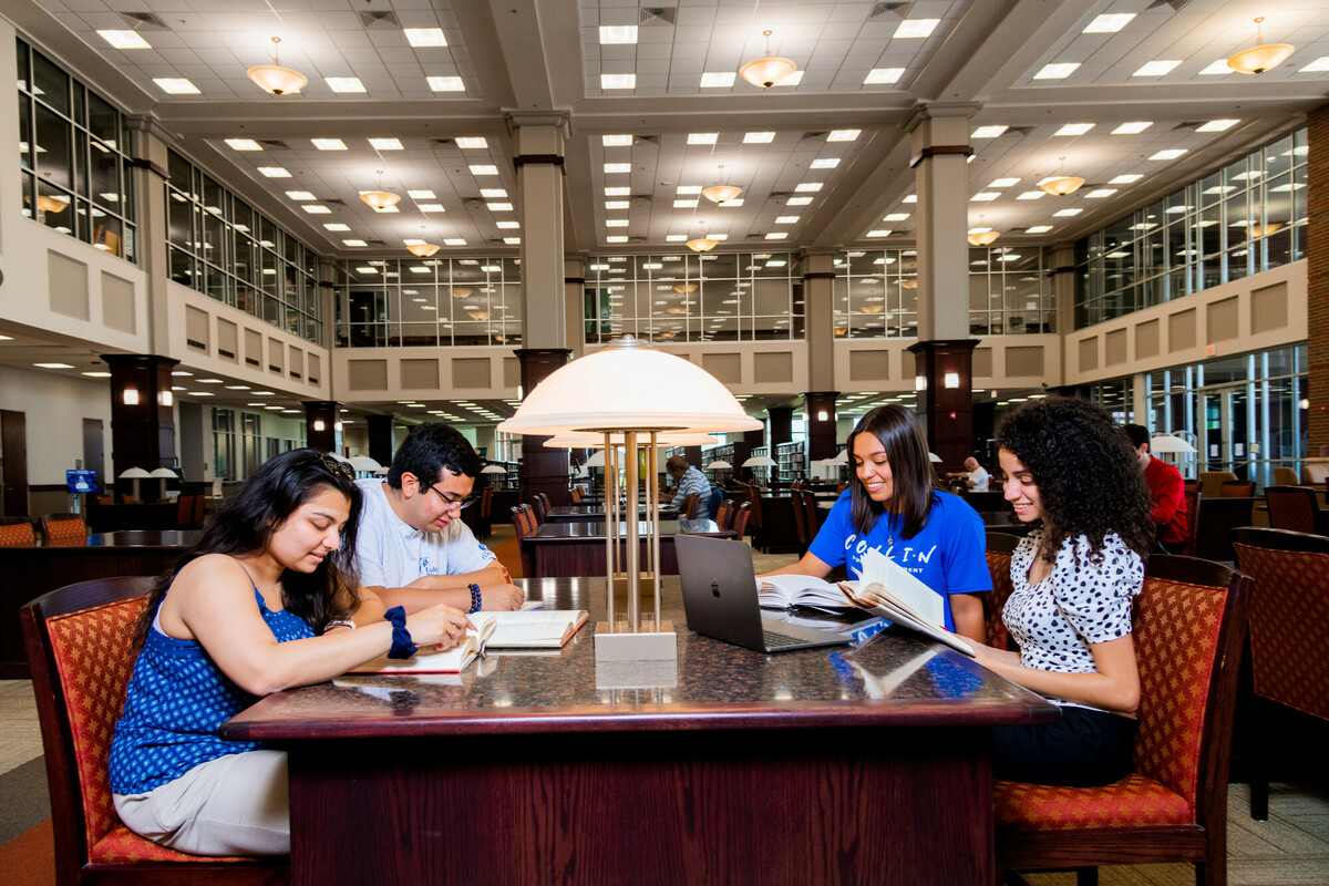 Students studying inside the library