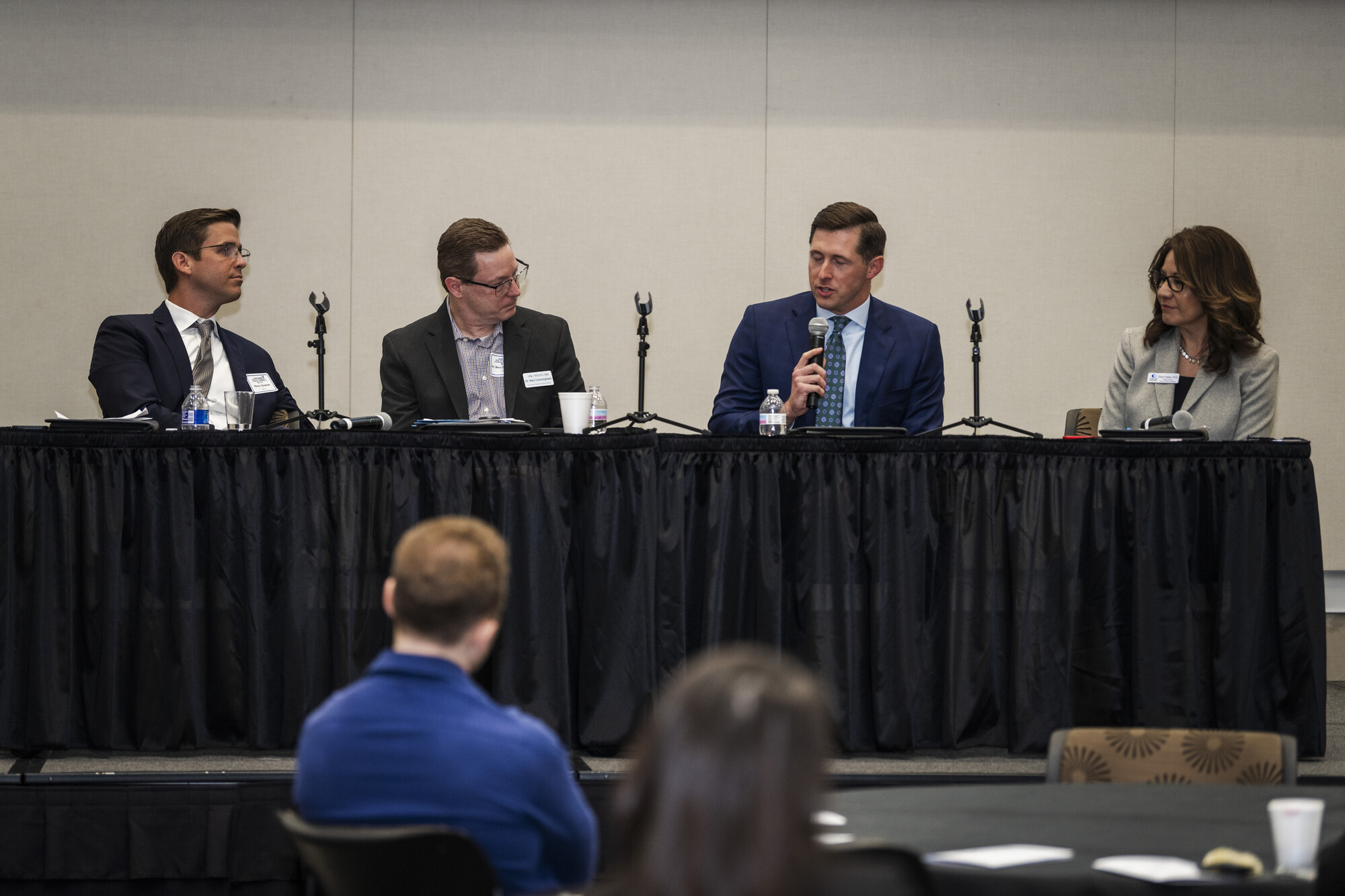 Panelists at the Building a Stronger Healthcare Ecosystem session address the audience. 