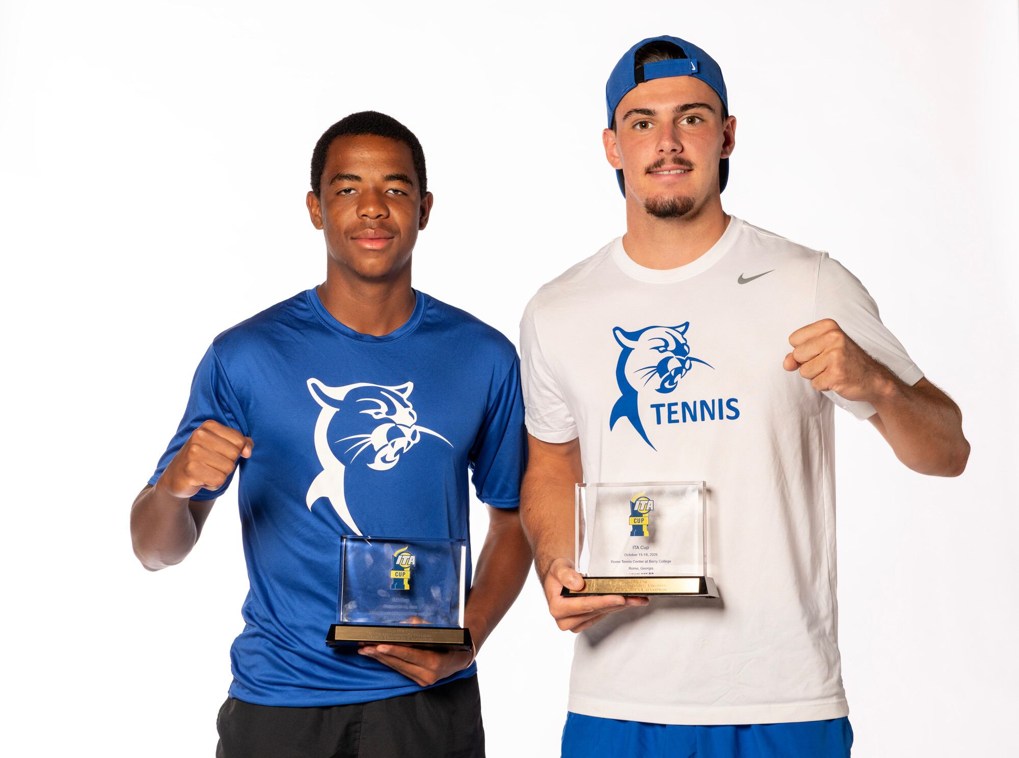 two men holding award